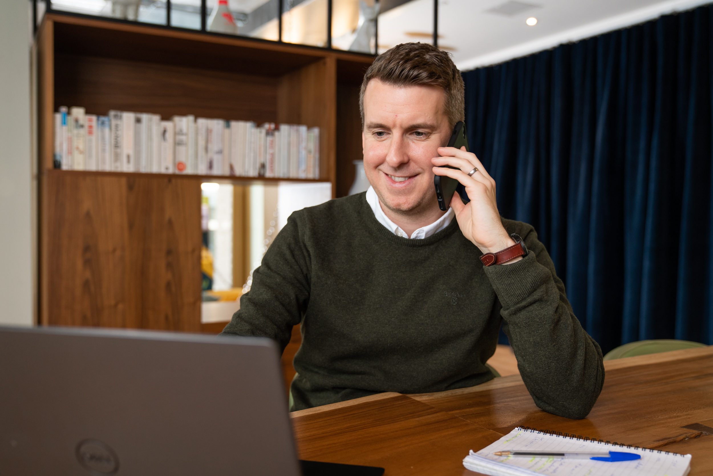 middle aged man, on phone, using laptop, working, portrait, business portrait